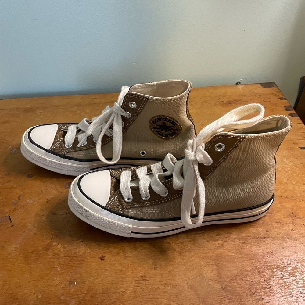 Brown Chuck Taylor all star high top converse